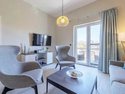 Ferienwohnung Columbus Suite Ostseebad Wustrow ZweiWasser Alte Seefahrtschule Wohnzimmer