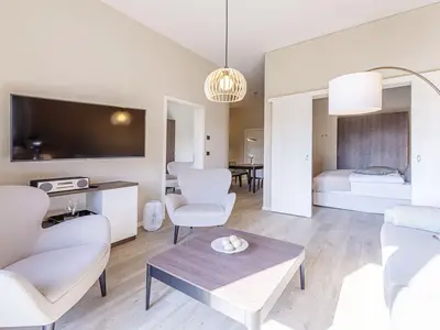 Ferienwohnung Humboldsuite Ostseebad Wustrow ZweiWasser Alte Seefahrtschule Wohnzimmer