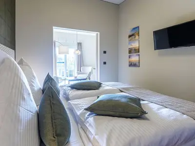 Ferienwohnung Humboldsuite Ostseebad Wustrow ZweiWasser Alte Seefahrtschule Schlafzimmer