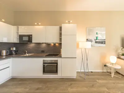 Ferienwohnung Sonnengott in Wustrow Blick auf die Küche