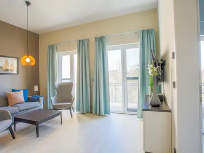 Ferienwohnung Marco Polo Ostseebad Wustrow ZweiWasser Alte Seefahrtschule Wohnzimmer