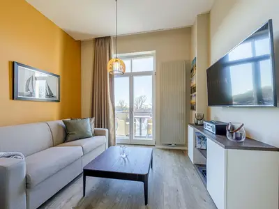 Ferienwohnung Ostseezeit Ostseebad Wustrow ZweiWasser Alte Seefahrtschule Wohnzimmer