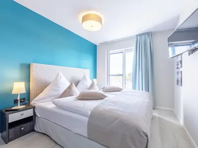 Ferienwohnung Boddensonne Ostseebad Wustrow ZweiWasser Alte Seefahrtschule Schlafzimmer mit Doppelbett