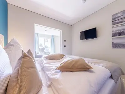 Ferienwohnung Boddenflair Ostseebad Wustrow ZweiWasser Alte Seefahrtschule Schlafzimmer mit Doppelbett