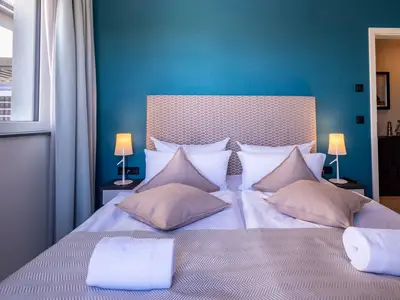 Ferienwohnung Seestern Wustrow Schlafzimmer mit Boxspringbett