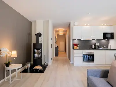 Ferienwohnung Seeluft Wustrow Wohnzimmer mit Kamin