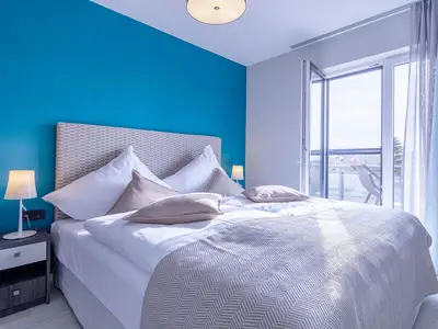 Ferienwohnung Boddenglück Ostseebad Wustrow ZweiWasser Alte Seefahrtschule Schlafzimmer mit Doppelbett
