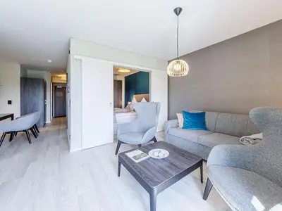 Ferienwohnung Boddenperle Ostseebad Wustrow ZweiWasser Alte Seefahrtschule Gemütliches Wohnzimmer