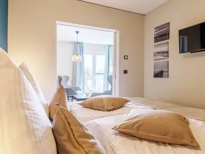 Ferienwohnung Boddenperle Ostseebad Wustrow ZweiWasser Alte Seefahrtschule Schlafzimmer mit Doppelbett