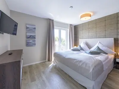 Ferienwohnung Boddendeck Ostseebad Wustrow ZweiWasser Alte Seefahrtschule Schlafzimmer mit Doppelbett