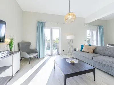Ferienwohnung Seeräuber Ostseebad Wustrow Wohnzimmer mit Balkon