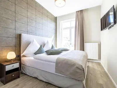 Ferienwohnung Ostseequartier Ostseebad Wustrow Schlafzimmer mit Boxspringbett