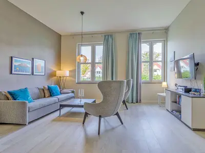 Ferienwohnung Lütt Matten Wustrow ZweiWasser Alte Seefahrtschule Wohnzimmer