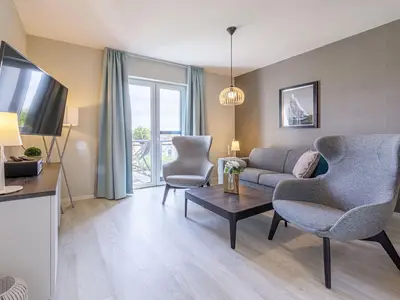 Ferienwohnung Boddensonne Ostseebad Wustrow ZweiWasser Alte Seefahrtschule Gemütlicher Wohnbereich