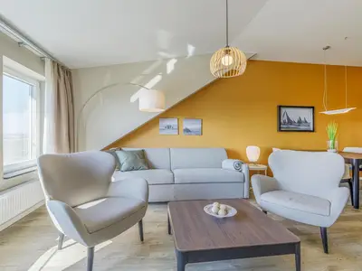 erienwohnung Dünenidylle Ostseebad Wustrow ZweiWasser Alte Seefahrtschule Gemütliche Sofa Ecke