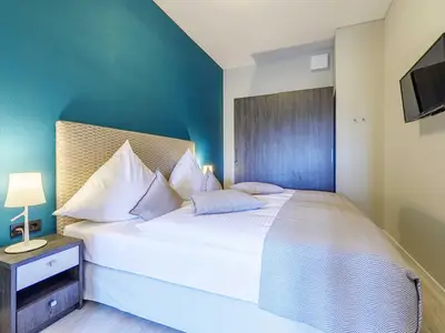 Ferienwohnung Columbus Suite Ostseebad Wustrow ZweiWasser Alte Seefahrtschule Schlafzimmer