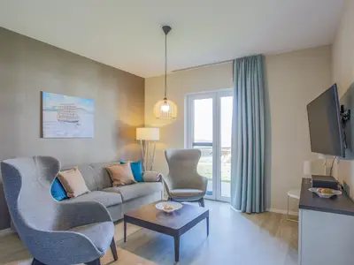 Ferienwohnung Boddenlümmel Ostseebad Wustrow ZweiWasser Alte Seefahrtschule Wohnzimmer
