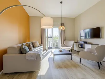 Ferienwohnung Humboldsuite Ostseebad Wustrow ZweiWasser Alte Seefahrtschule Gemütliches Wohnzimmer