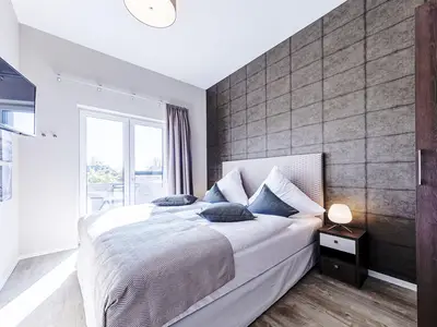 Ferienwohnung Humboldsuite Ostseebad Wustrow ZweiWasser Alte Seefahrtschule Schlafzimmer