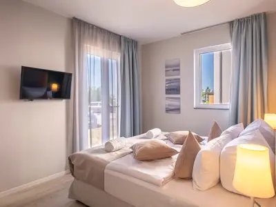 Ferienwohnung Seestern Wustrow Schlafzimmer mit TV