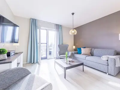 Ferienwohnung Boddenglück Ostseebad Wustrow ZweiWasser Alte Seefahrtschule Lichtdurchflutetes Wohnzimmer