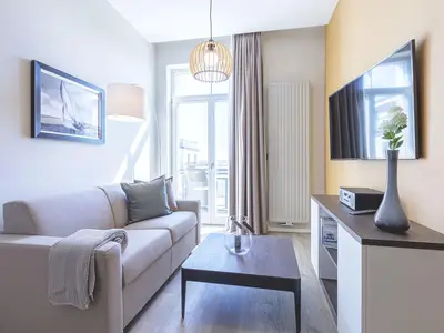 Ferienwohnung Ostseequartier Ostseebad Wustrow Wohnzimmer mit Balkon