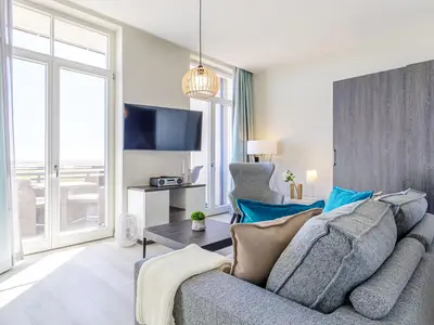 Ferienwohnung Große Welle Ostseebad Wustrow ZweiWasser Alte Seefahrtschule Wohnzimmer