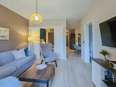 Ferienwohnung Kroonkieker Ostseebad Wustrow ZweiWasser Alte Seefahrtschule Wohnzimmer mit TV