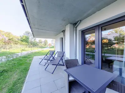 Ferienwohnung Große Strandburg Ostseebad Wustrow ZweiWasser Alte Seefahrtschule Terrasse mit Garten