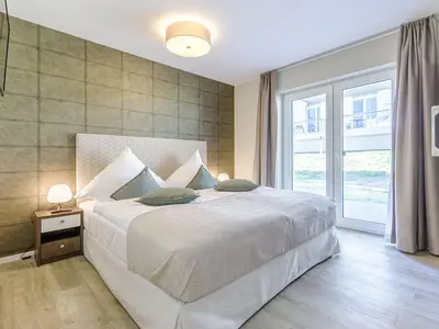 Ferienwohnung Großer Strandkorb Ostseebad Wustrow ZweiWasser Alte Seefahrtschule Schlafzimmer