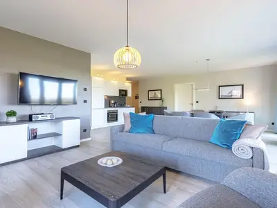 Ferienwohnung Strandlaeufer Ostseebad Wustrow ZweiWasser Alte Seefahrtschule Gemütliches Wohnzimmer