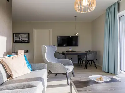 Ferienwohnung Strandblick Ostseebad Wustrow ZweiWasser Alte Seefahrtschule Gemütlicher Wohnbereich