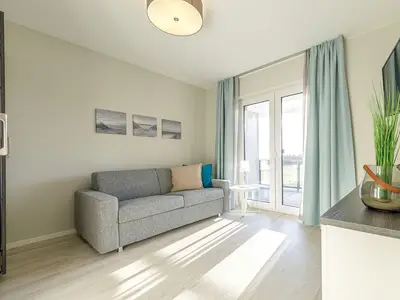 Ferienwohnung Strandblick Ostseebad Wustrow ZweiWasser Alte Seefahrtschule Gemütliches Sofa