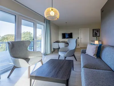 Ferienwohnung Strandlounge Ostseebad Wustrow ZweiWasser Alte Seefahrtschule Gemütliches Wohnzimmer