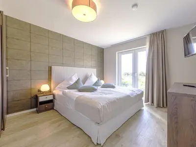 Ferienwohnung Strandliebe Ostseebad Wustrow ZweiWasser Alte Seefahrtschule Schlafzimmer