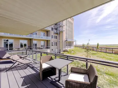Ferienwohnung Große Strandmuschel Ostseebad Wustrow ZweiWasser Alte Seefahrtschule Sonnenbaden auf dem Balkon
