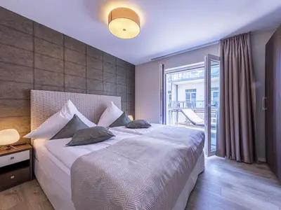 Ferienwohnung Große Strandoase Ostseebad Wustrow ZweiWasser Alte Seefahrtschule Schlafzimmer mit Balkonzugang