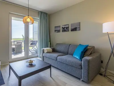 Ferienwohnung Große Strandmuschel Ostseebad Wustrow ZweiWasser Alte Seefahrtschule Wohnbereich