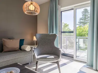 Ferienwohnung Wiesenkieker Ostseebad Wustrow - ZweiWasser Alte Seefahrtschule Wohnbereich