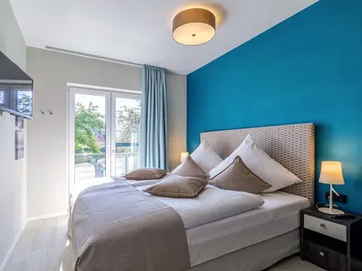 Ferienwohnung Wiesenkieker Ostseebad Wustrow - ZweiWasser Alte Seefahrtschule Schlafzimmer