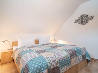 Schlafzimmer mit Doppelbett