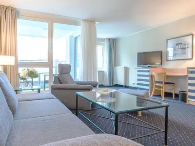 Ferienwohnung Deichblick Aparthotel Zingst - wohnraum mit Aussicht