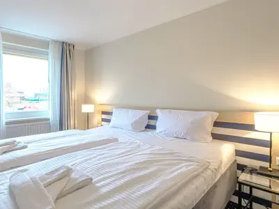 Ferienwohnung Deichblick Aparthotel Zingst - Schlafzimmer