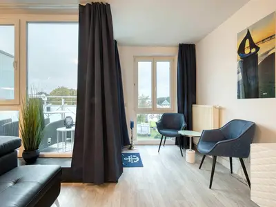Ferienwohnung Ostseeschatz Aparthotel Zingst - Wohnzimmer