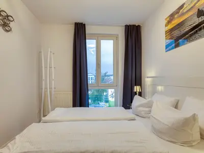 Ferienwohnung Ostseeschatz Aparthotel Zingst - Schlafzimmer
