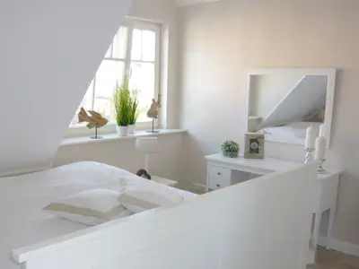 Schlafzimmer mit Doppelbett