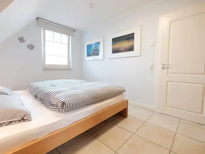 Schlafzimmer mit Doppelbett