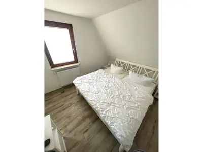 Schlafzimmer mit Doppelbett