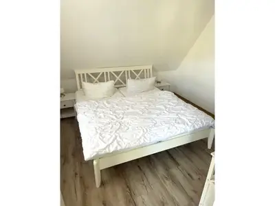 Schlafzimmer mit Doppelbett