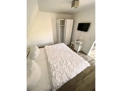 Schlafzimmer mit Doppelbett